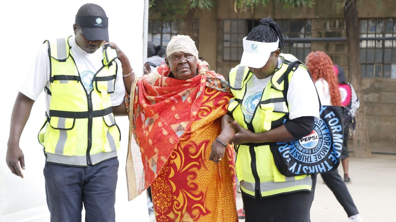 Patient receiving assistance at medical camp