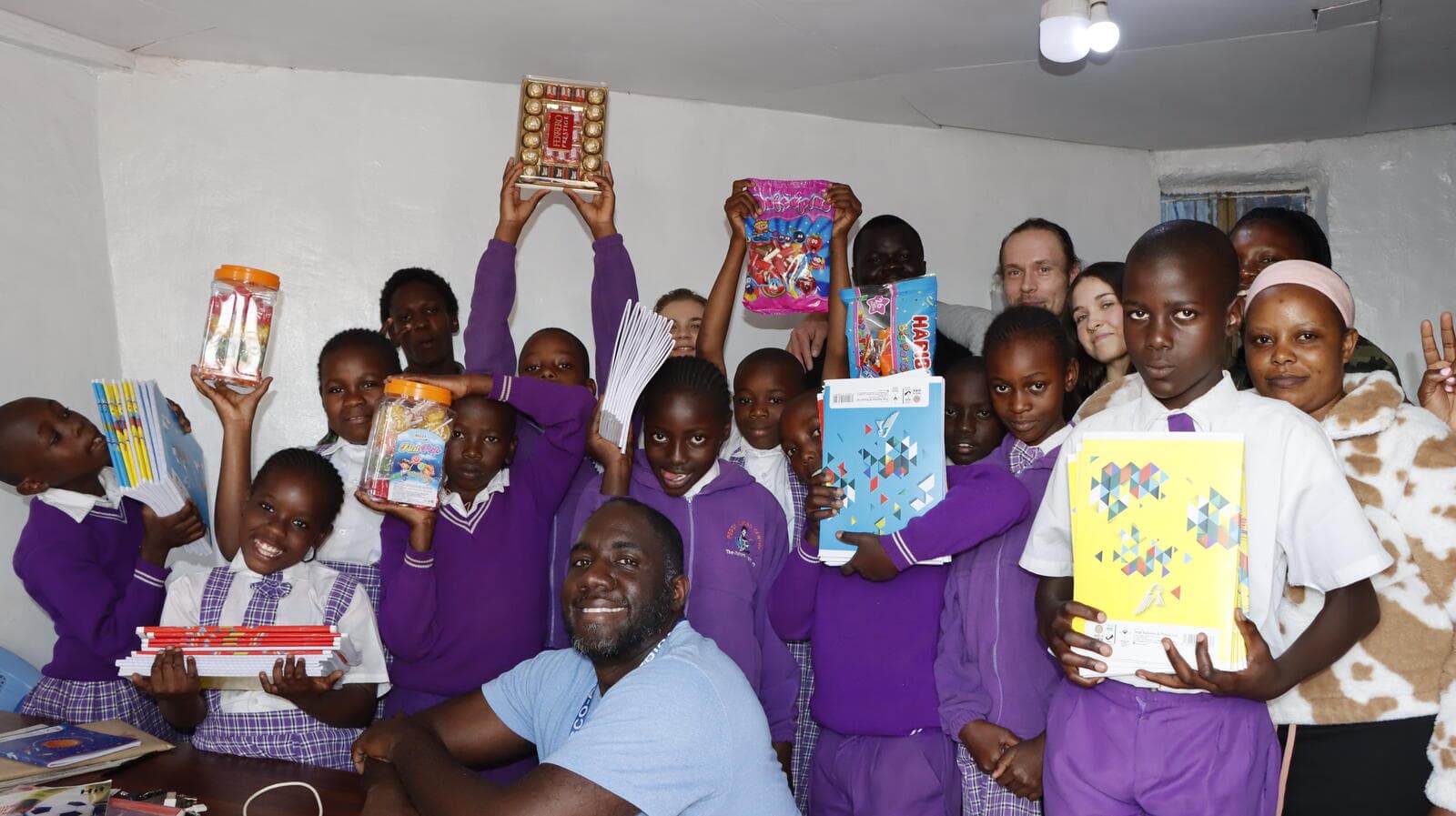 School children with donated books